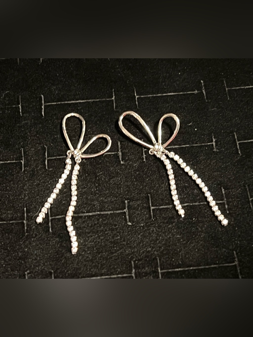 Elegant Silver toned  Bow Drop Earrings with CZ Dangles